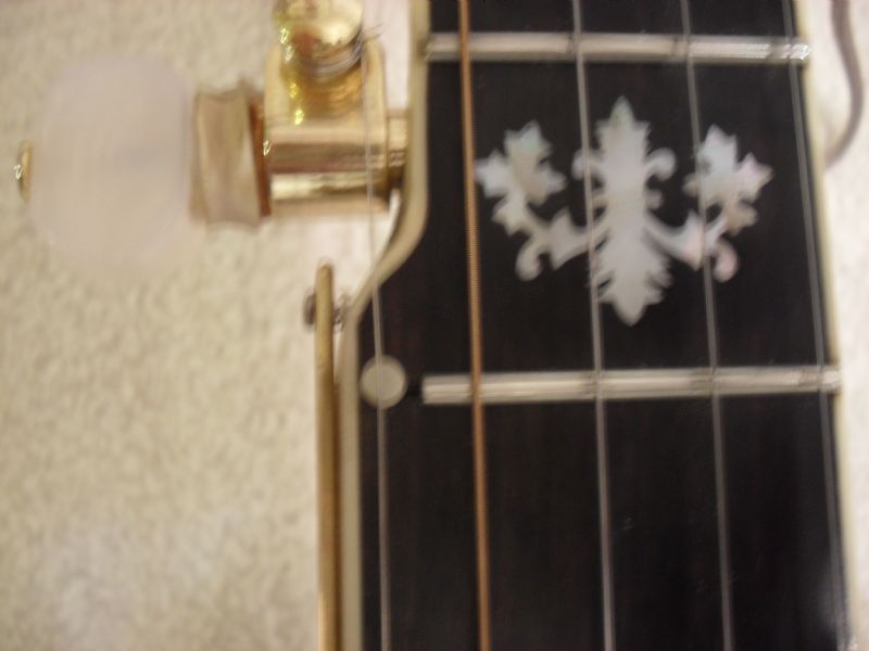 5th string capo, tacks, or tuning up - Discussion Forums - Banjo