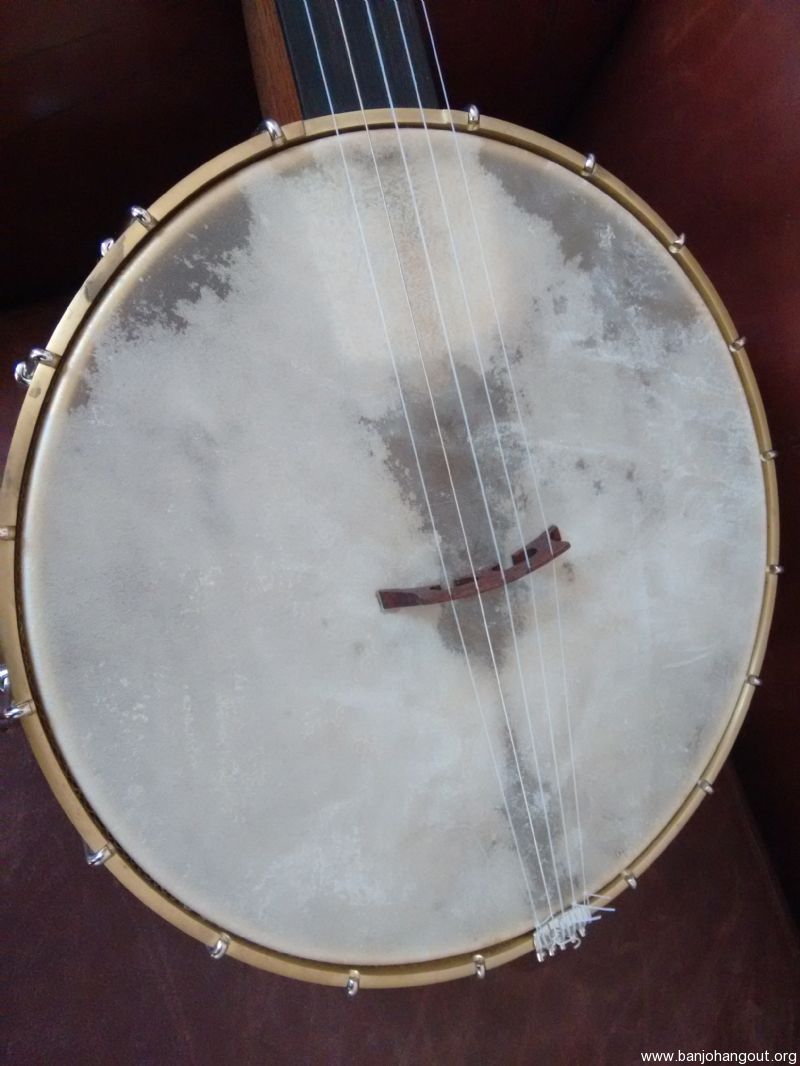 banjo changing between nylon and metal strings